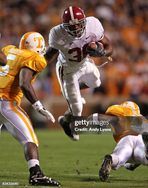 Glen Coffee of the Alabama Crimson Tide jumps over a defender during the game against the Tennessee Volunteers at Neyland Stadium on October 25, 2008...