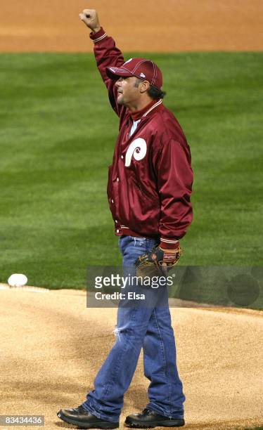 Country music singer Tim McGraw stands on the mound before the Philadelphia Phillies take on the Tampa Bay Rays during game three of the 2008 MLB...