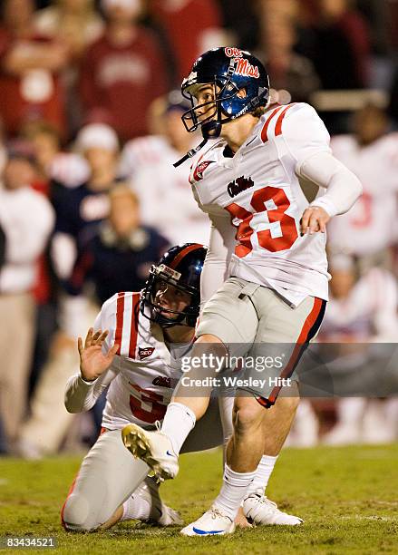 Joshua Shene of the Ole Miss Rebels kicks a field goal to seal the victory against the Arkansas Razorbacks at Donald W. Reynolds Stadium on October...