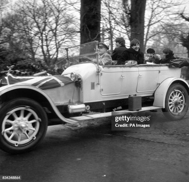 The Beatles in a chauffeur driven vintage Rolls-Royce tourer, at ABC Television studios at Teddington, Middlesex, where the group were taking part in...