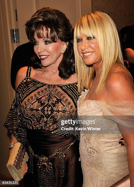 Actress Joan Collins and actress Suzanne Somers pose during the cocktail reception at the 30th anniversary Carousel of Hope Ball to benefit the...