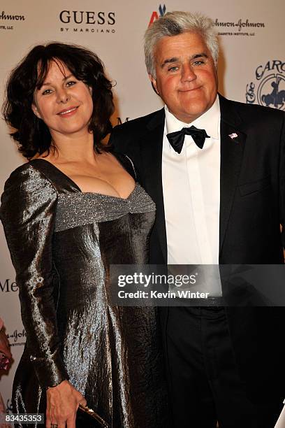 Personality Jay Leno and wife Mavis Nicholson pose during the cocktail reception at the 30th anniversary Carousel of Hope Ball to benefit the Barbara...