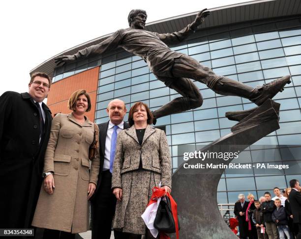 Chief Executive Brian Barwick unveils a statue of Emlyn Hughes, with Emlyn's former wife Barbara Hughes , daughter Emma and Son Emlyn outside the...