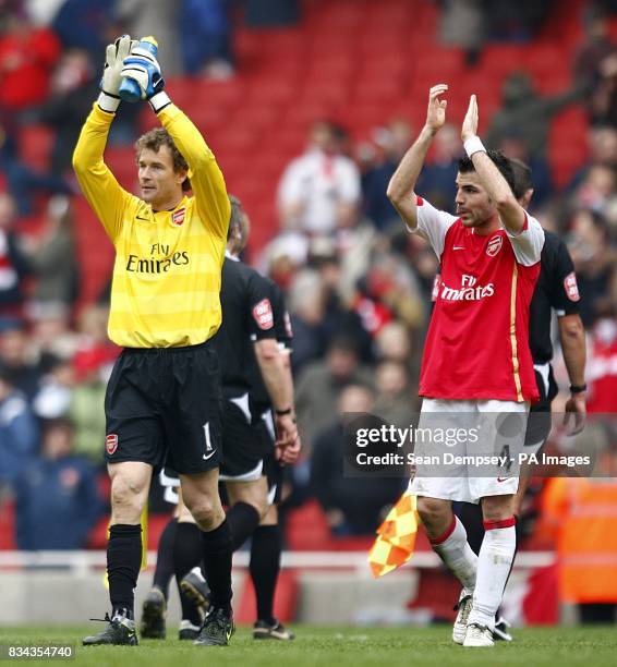 Arsenal goalkeeper Jens Lehmann and team mate Francesc Fabregas applaud the fans