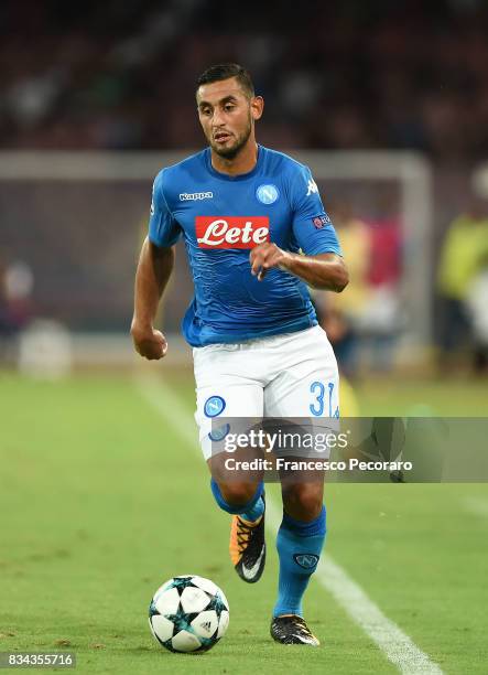 Faouzi Ghoulam of SSC Napoli in action during the UEFA Champions League Qualifying Play-Offs Round First Leg match between SSC Napoli and OGC Nice at...