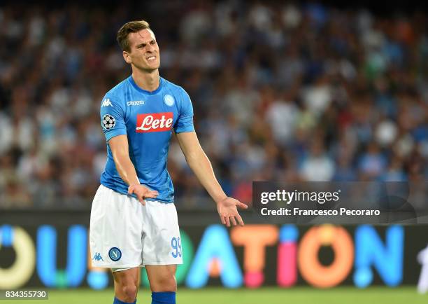 Arkadiusz Milik of SSC Napoli in action during the UEFA Champions League Qualifying Play-Offs Round First Leg match between SSC Napoli and OGC Nice...