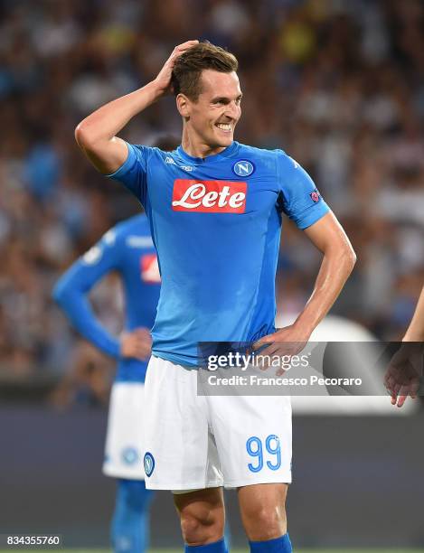 Arkadiusz Milik of SSC Napoli in action during the UEFA Champions League Qualifying Play-Offs Round First Leg match between SSC Napoli and OGC Nice...