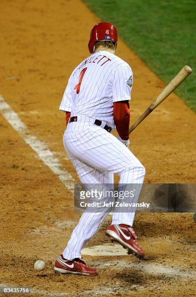 Grant Balfour of the Tampa Bay Rays hits Eric Bruntlett of the Philadelphia Phillies with a pitch during game three of the 2008 MLB World Series on...