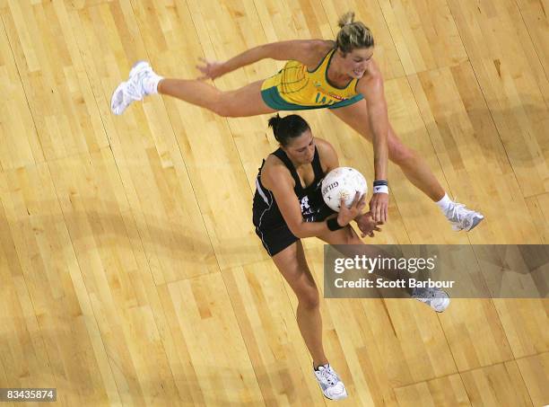 Liana Barrett-Chase of the Silver Ferns and Julie Prendergast of the Diamonds compete for the ball during game one of the Holden Netball Test Series...