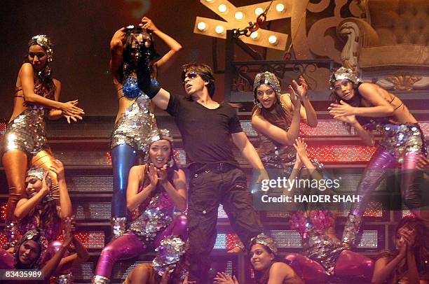 Indian Bollywood superstar Shahrukh Khan performs during the Temptation Reloaded 2008 Tour in the Gulf emirate of Dubai, late October 25, 2008. Khan...