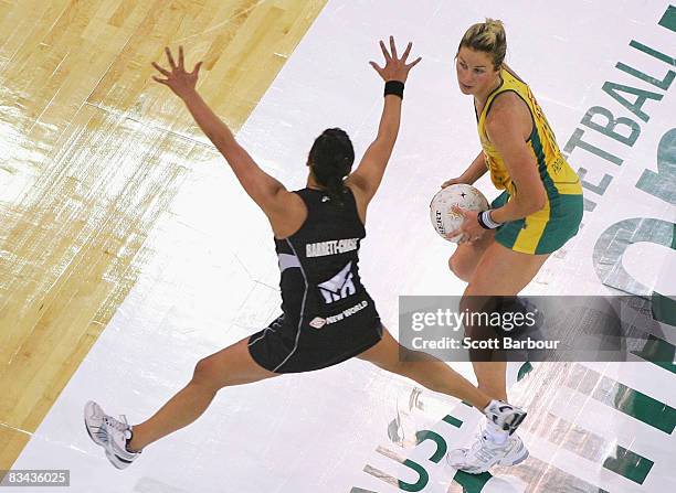 Julie Prendergast of the Diamonds looks to pass the ball as Liana Barrett-Chase of the Silver Ferns defends during game one of the Holden Netball...