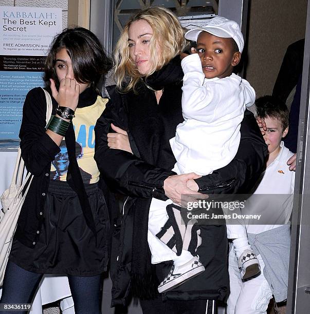 Lourdes Leon, Madonna, David Banda and Rocco Ritchie leave the Kabbalah Center in Manhattan on October 24, 2008 in New York City.