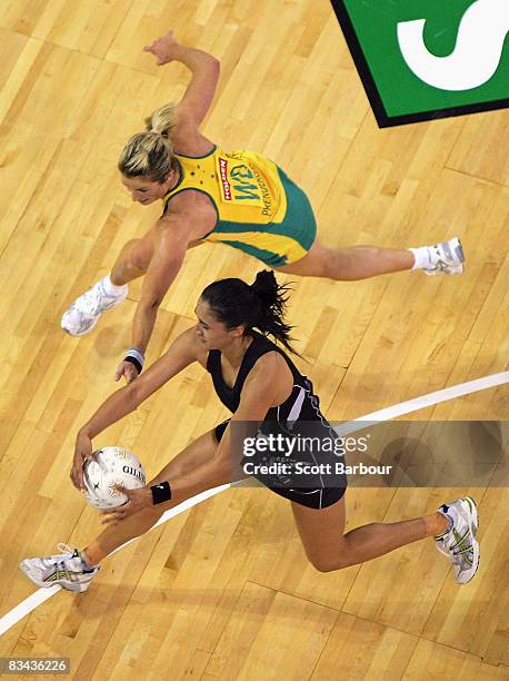 Maria Tutaia of the Silver Ferns and Julie Prendergast of the Diamonds compete for the ball during game one of the Holden Netball Test Series between...