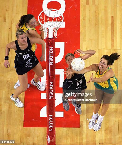 Casey Williams of the Silver Ferns and Kate Beveridge of the Diamonds compete for the ball during game one of the Holden Netball Test Series between...