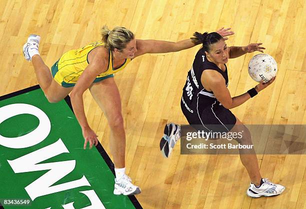 Liana Barrett-Chase of the Silver Ferns and Julie Prendergast of the Diamonds compete for the ball during game one of the Holden Netball Test Series...