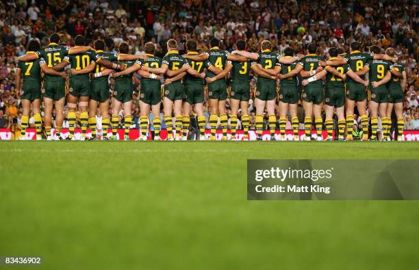 The Kangaroos line-up during the singing of the national anthem before the Rugby League World Cup Pool 1 match between the Australian Kangaroos and...