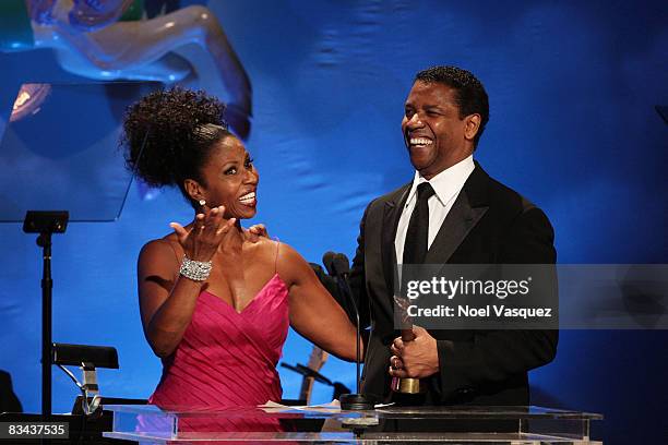 Pauletta Washington and Denzel Washington speak on stage at the 30th Anniversary Carousel Of Hope Ball at The Beverly Hilton Hotel on October 25,...