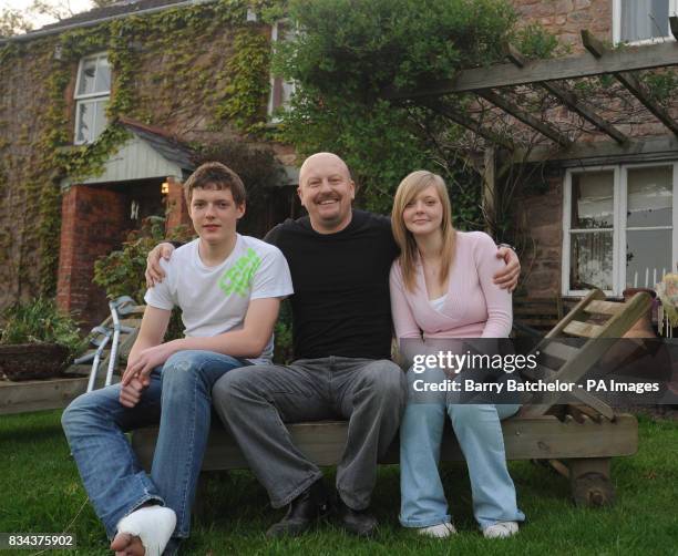 Roger Vine, stepfather of Alex Haines, with two of his children, Cameron, aged 13, and Chloe at home in Aylburton, Forest of Dean.