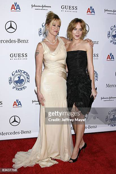 Melanie Griffith and daughter Dakota Johnson arrive at The 30th Anniversary Carousel Of Hope Ball at The Beverly Hilton Hotel on October 25, 2008 in...