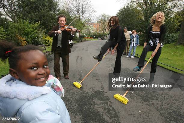 Fiddle player Frankie Gavin, and Brush dancers Aisline Cunningham and Edwina Guckian are watched by Khanyisile as they launch the World Fleadh, the...