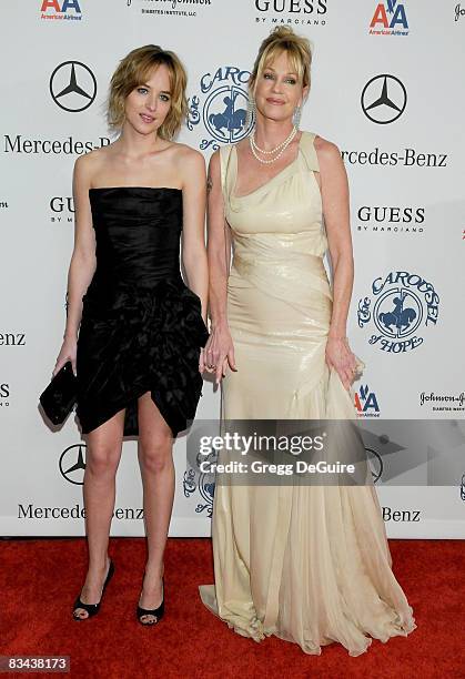 Actress Dakota Johnson and Actress Melanie Griffith arrive at The 30th Anniversary Carousel Of Hope Ball at The Beverly Hilton Hotel on October 25,...