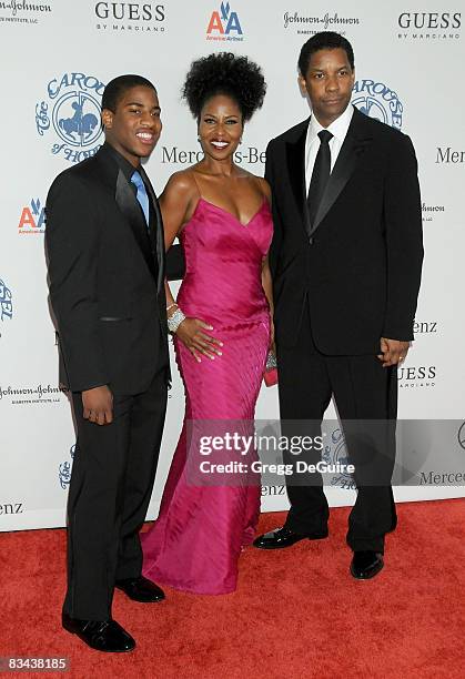 Actor Denzel Washington, Wife Pauletta Washington and Son Malcolm arrive at The 30th Anniversary Carousel Of Hope Ball at The Beverly Hilton Hotel on...