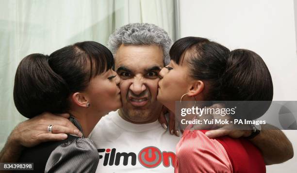 Gabriela and Monica Irimia of the Cheeky Girls with director Alki David , during a photocall for their film 'Killing The Cheeky Girls', at 111...