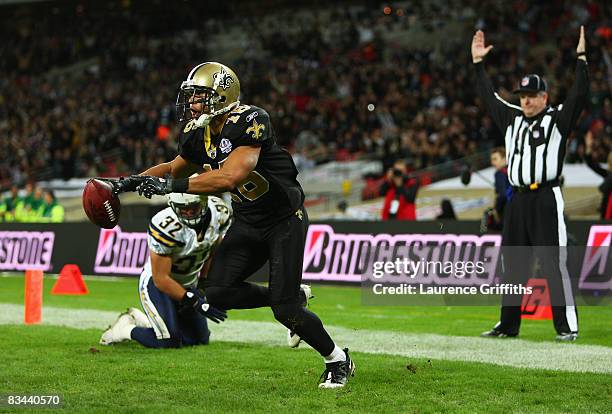 Lance Moore of the New Orleans Saints scores a touchdown during the Bridgestone International Series NFL match between San Diego Chargers and New...