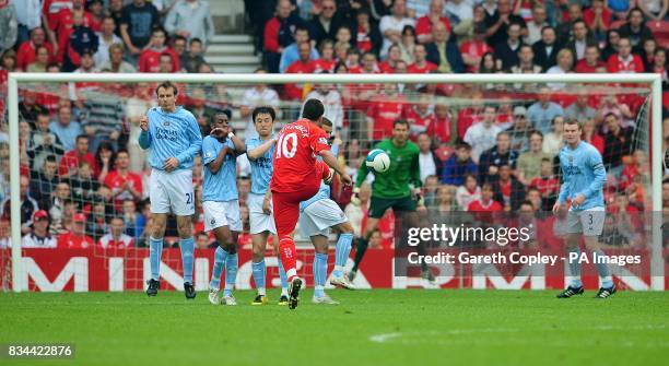 Middlesbrough's Fabio Rochemback scores his sides sixth goal of the game from a free kick