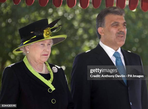 Britain's Queen Elizabeth II attends a welcoming ceremony at the Presidential Palace with President Abdullah Gul on the first day of their State...