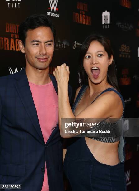 George Young and Janet Hsieh attend the Premiere Of WWE Studios' "Birth Of The Dragon" at ArcLight Hollywood on August 17, 2017 in Hollywood,...