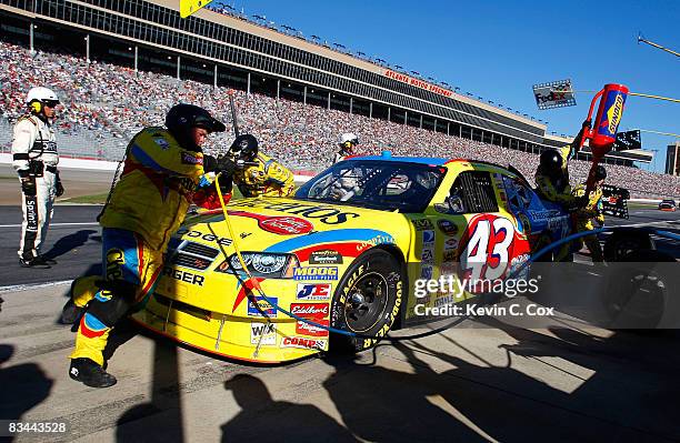 Bobby Labonte, driver of the Cheerios/Betty Crocker Dodge, pits during the NASCAR Sprint Cup Series Pep Boys Auto 500 at Atlanta Motor Speedway on...