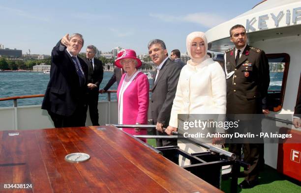 Britain's Queen Elizabeth II takes a boat trip along the Bosporus Strait, the largest shipping channel in the world, with Turkish President Abdullah...