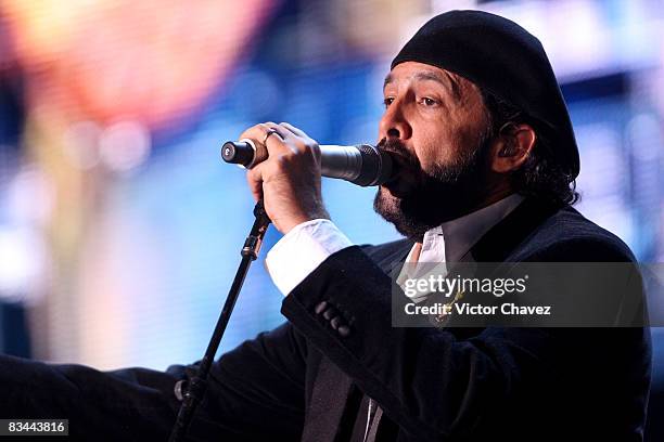Singer Juan Luis Guerra performs onstage during "ALAS" El Concierto Por Los Ninos at Zocalo La Plaza de la Constitucion on May 17, 2008 in Mexico...