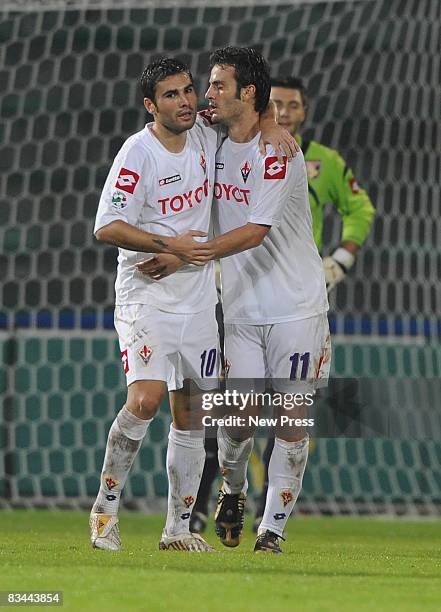 Alberto Gilardino and Adrian Mutu of Fiorentina celebrate during the Serie A match between Palermo and Fiorentina at the Stadio Barbera on October...