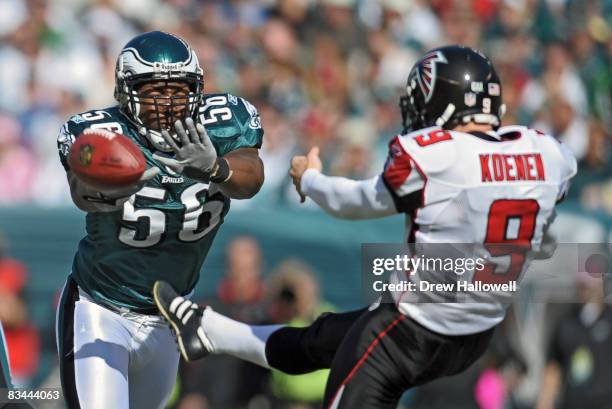 Linebacker Akeem Jordan of the Philadelphia Eagles tries to block a punt by punter Michael Koenen of the Atlanta Falcons on October 26, 2008 at...