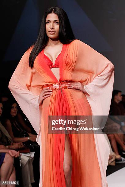 Indian model and current Miss India Parvathy Omanakuttan showcases a design by Raakesh Agarvwal on the catwalk during Lakme Fashion Week 2008 day 5...