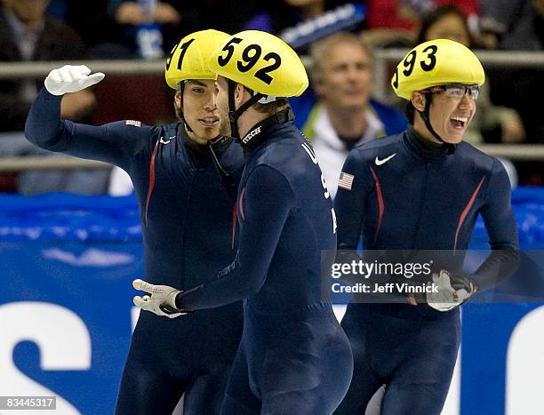 Apolo Anton Ohno, Jeff Simon and J.R. Celski of the United States celebrate their first place win during the men's 5000m relay at the ISU World Cup...