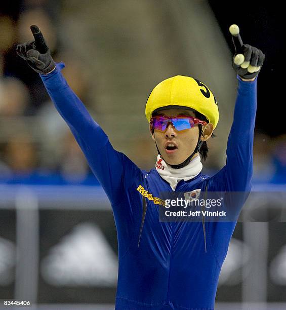 Jung-Su Lee of South Korea celebrates celebrates his first place finish in the men's 1000m final at the ISU World Cup Speed short track speed skating...