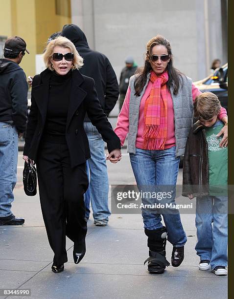 Joan Rivers and Melissa Rivers walk along Madison Avenue on October 27, 2008 in New York City.