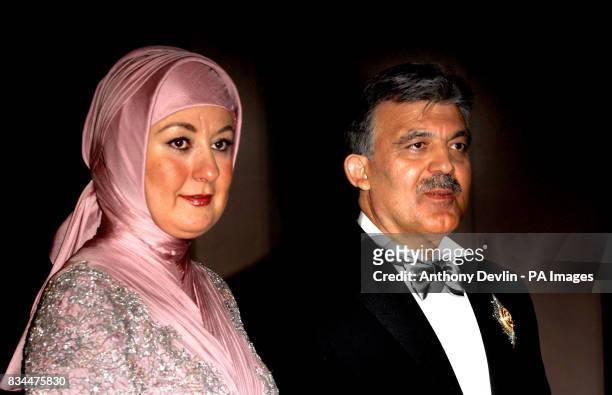 President Abdullah Gul and wife Hayrunnisa Gul wait to receive Britain's Queen Elizabeth II at the Presidential Palace for a State Banquet in her...