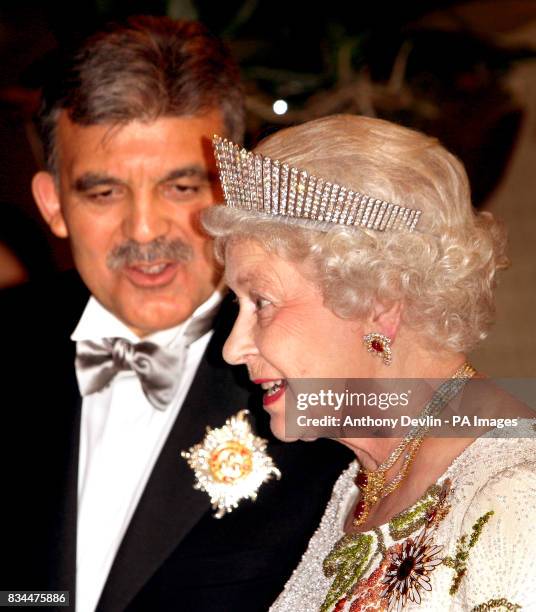 Britain's Queen Elizabeth II speaks to President Abdullah Gul in the formal receiving line at the Presidential Palace before a State Banquet in her...
