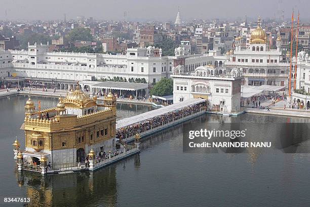 Indian Sikhs paying obeisance at the Golden temple on the eve of the festival of Bandi Chhor Divas in Amritsar on October 27, 2008. Bandi-Chhor Divas...