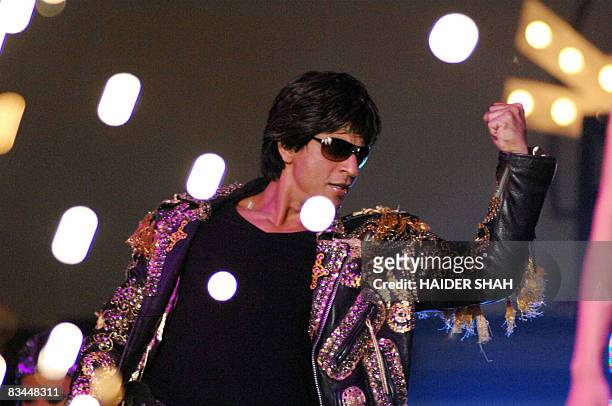 Indian Bollywood superstar Shahrukh Khan performs during the Temptation Reloaded 2008 Tour in the Gulf emirate of Dubai, late October 25, 2008. Khan...