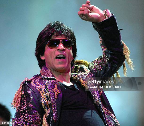 Indian Bollywood superstar Shahrukh Khan performs during the Temptation Reloaded 2008 Tour in the Gulf emirate of Dubai, late October 25, 2008. Khan...