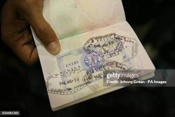 The passport of Zak Ahmed, from London, with numerous Egyptian stamps gained after attempting to board a Monarch from Egypt back to the UK.