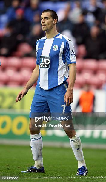Paul Scharner of Wigan Athletic in action during the FA Barclays Premier League match between Wigan Athletic v Aston Villa at the JJB Stadium on...