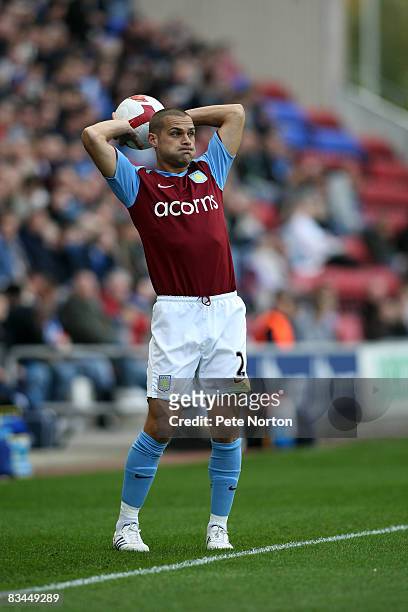 Luke Young of Aston Villa in action during the FA Barclays Premier League match between Wigan Athletic v Aston Villa at the JJB Stadium on October...