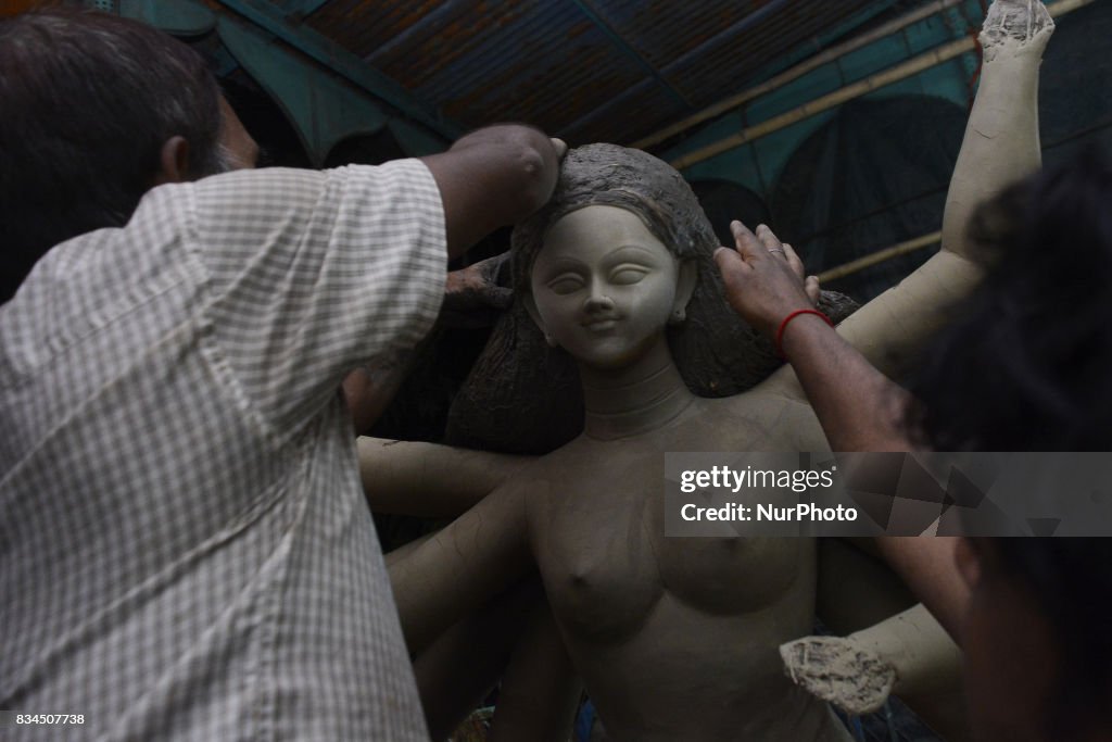 Bangladeshi artists preparing Puja celebration