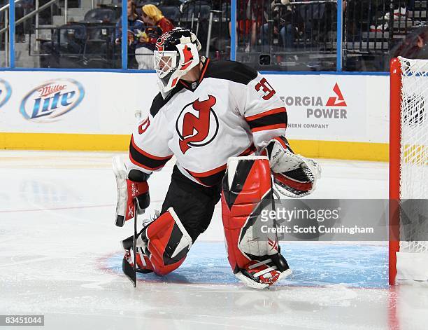 Martin Brodeur of the New Jersey Devils makes a save against the Atlanta Thrashers at Philips Arena on October 16, 2008 in Atlanta, Georgia.